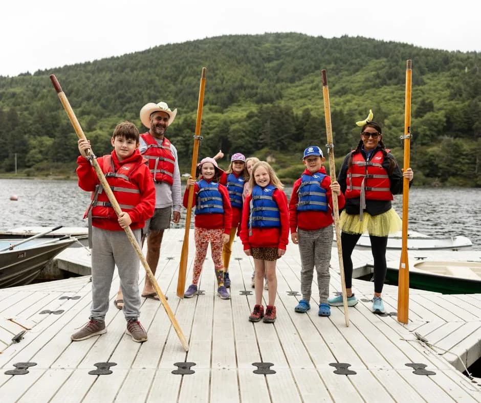 Bobo & Banana with campers boating 